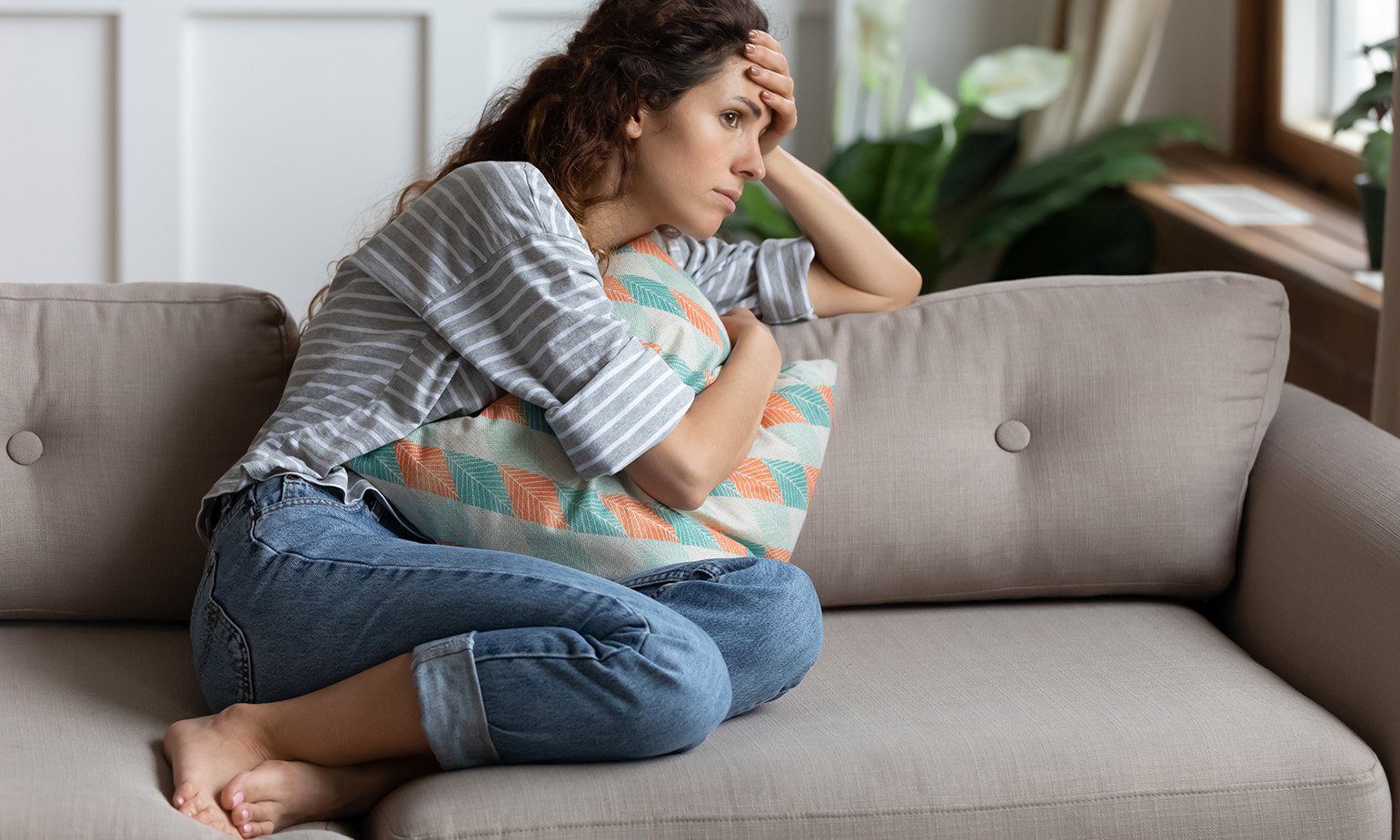 Women looking stressed at home